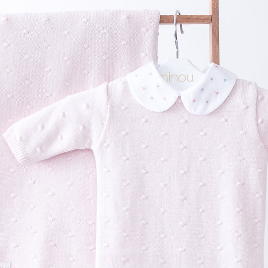 Macacão de bebê Boules rosa, da Ninou