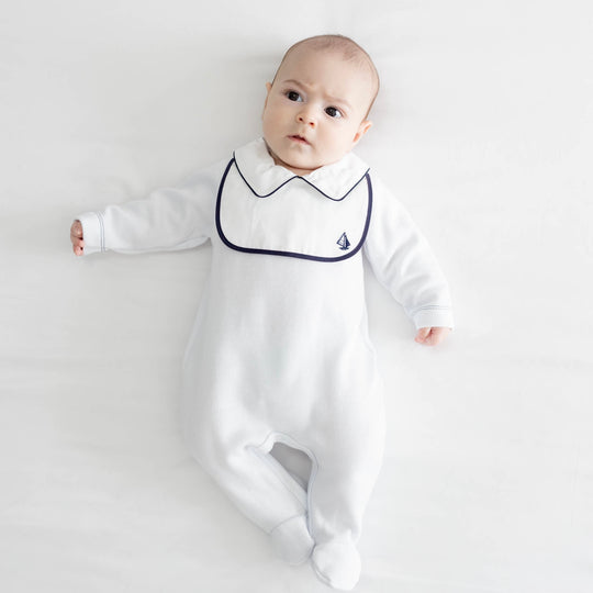 Macacão de bebê Ludic marinho, da Ninou